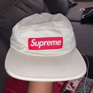 Cream and red Supreme hat